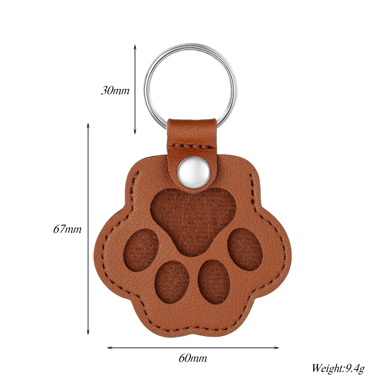 Brown leather keychain in the shape of a paw with measurements on a white background